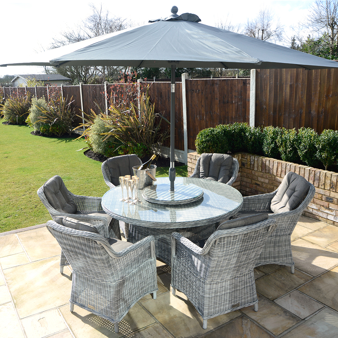 6 Seat Outdoor Cast Aluminium And Rattan Dining Sets Kensington Deluxe 140cm Round Table With 6 Henley Dining Armchairs Lazy Susan Slate